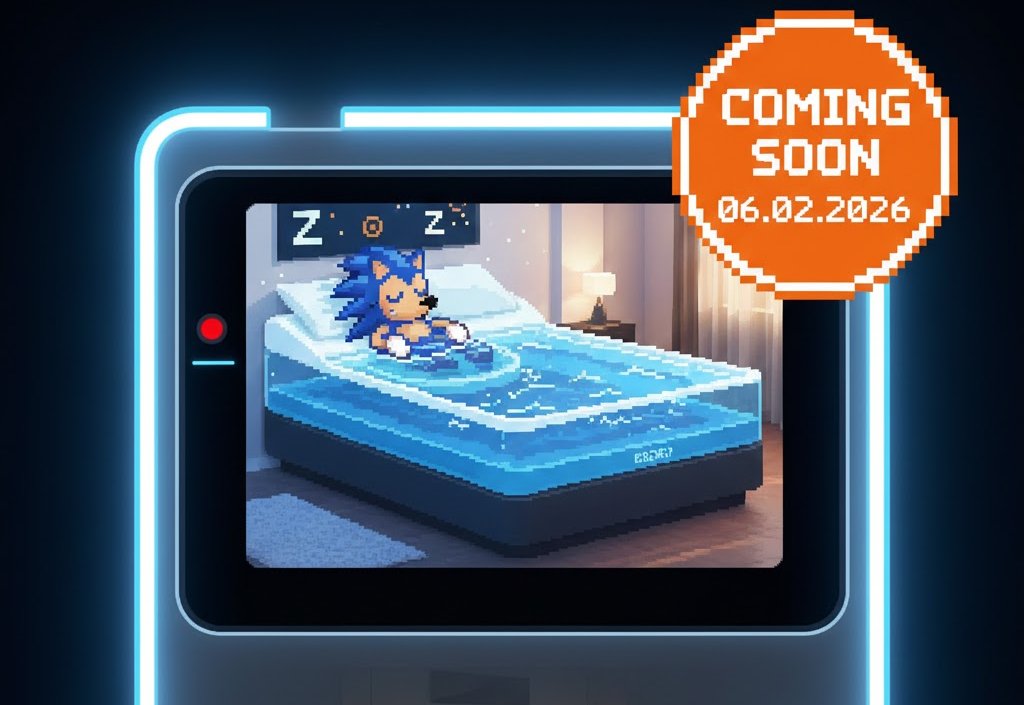 Retro Gaming Handheld mit Neon-Rahmen zeigt auf dem Bildschirm Sonic the Hedgehog, der in einem Wasserbett schläft. Orangefarbenes "Coming Soon 06.02.2026" Badge. Logo Megaschlaf Wasserbetten.